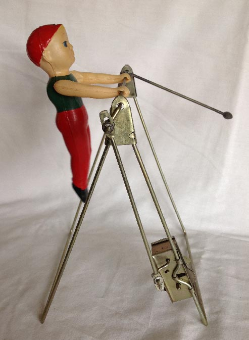 vintage clock work wind up toy with celluloid acrobat gymnast
